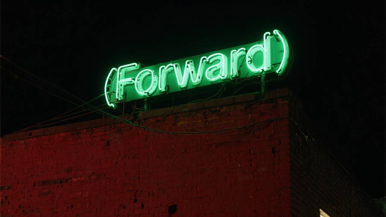 Neon sign reading "(Forward)" illuminated against a dark background.